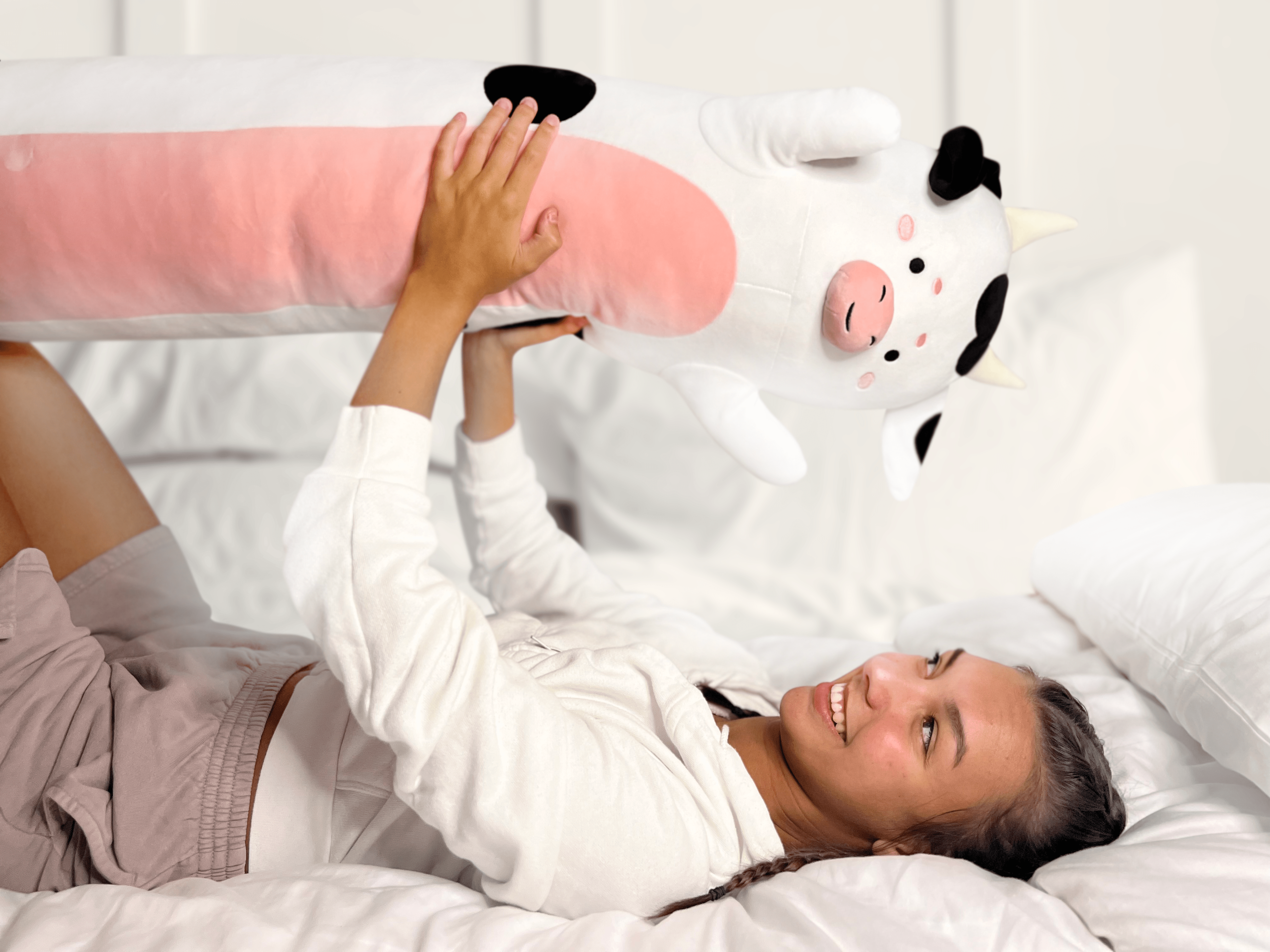 Almohada de peluche de vaca Cuddle Paws®