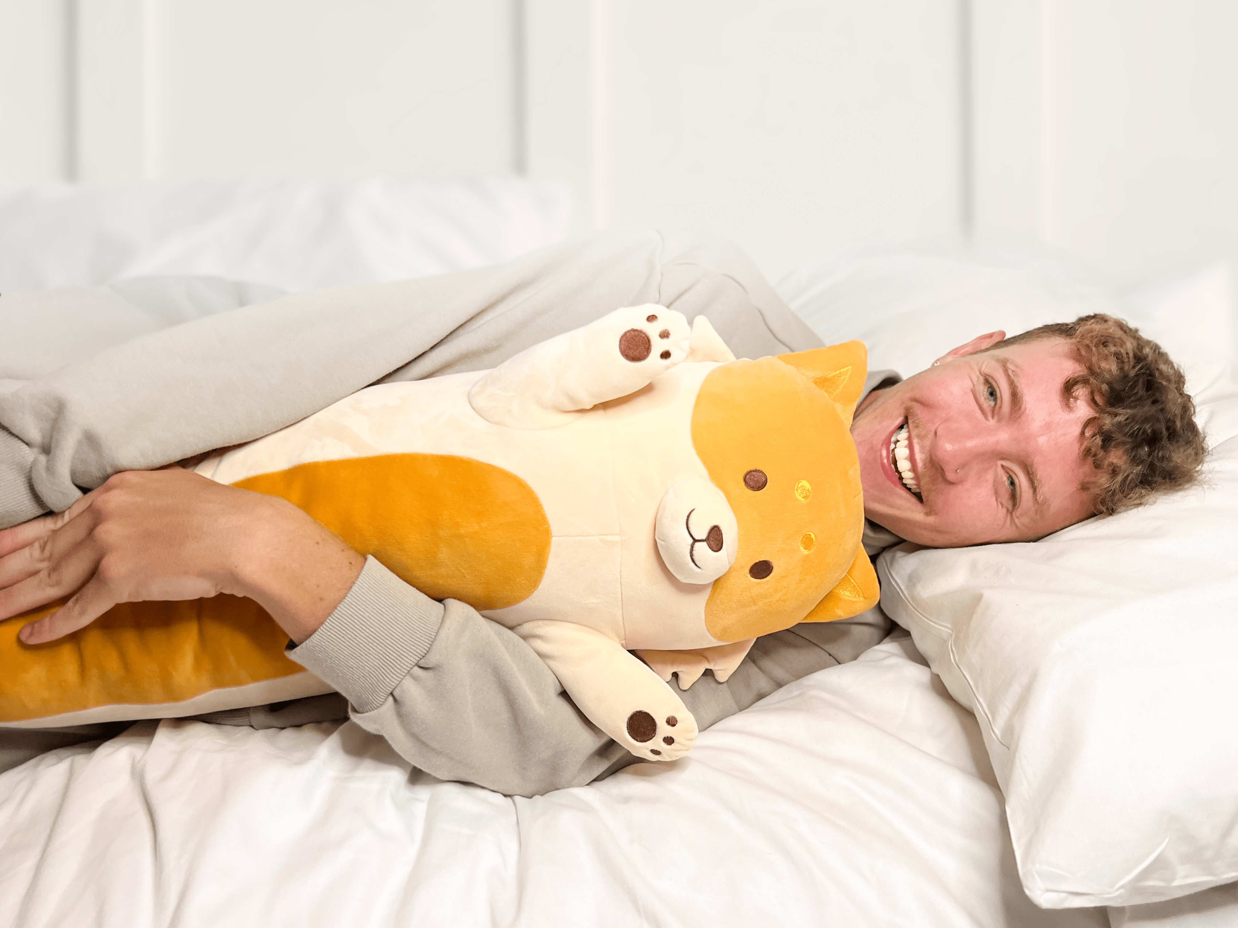 Cojín de peluche Cuddle Paws® Fox